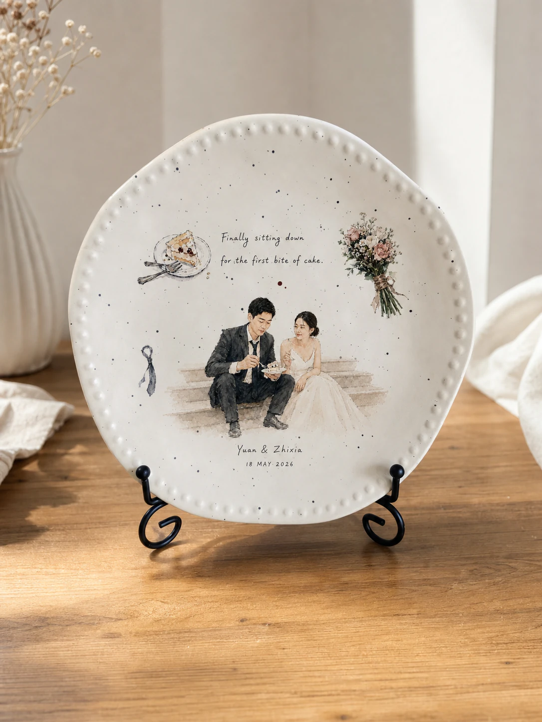 Final product mockup showing Yuan and Zhixia's approved watercolor artwork on a ceramic memory plate.